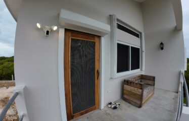Own the Only Property With Guaranteed Views on Both Sides of Caye Caulker