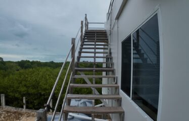 Own the Only Property With Guaranteed Views on Both Sides of Caye Caulker
